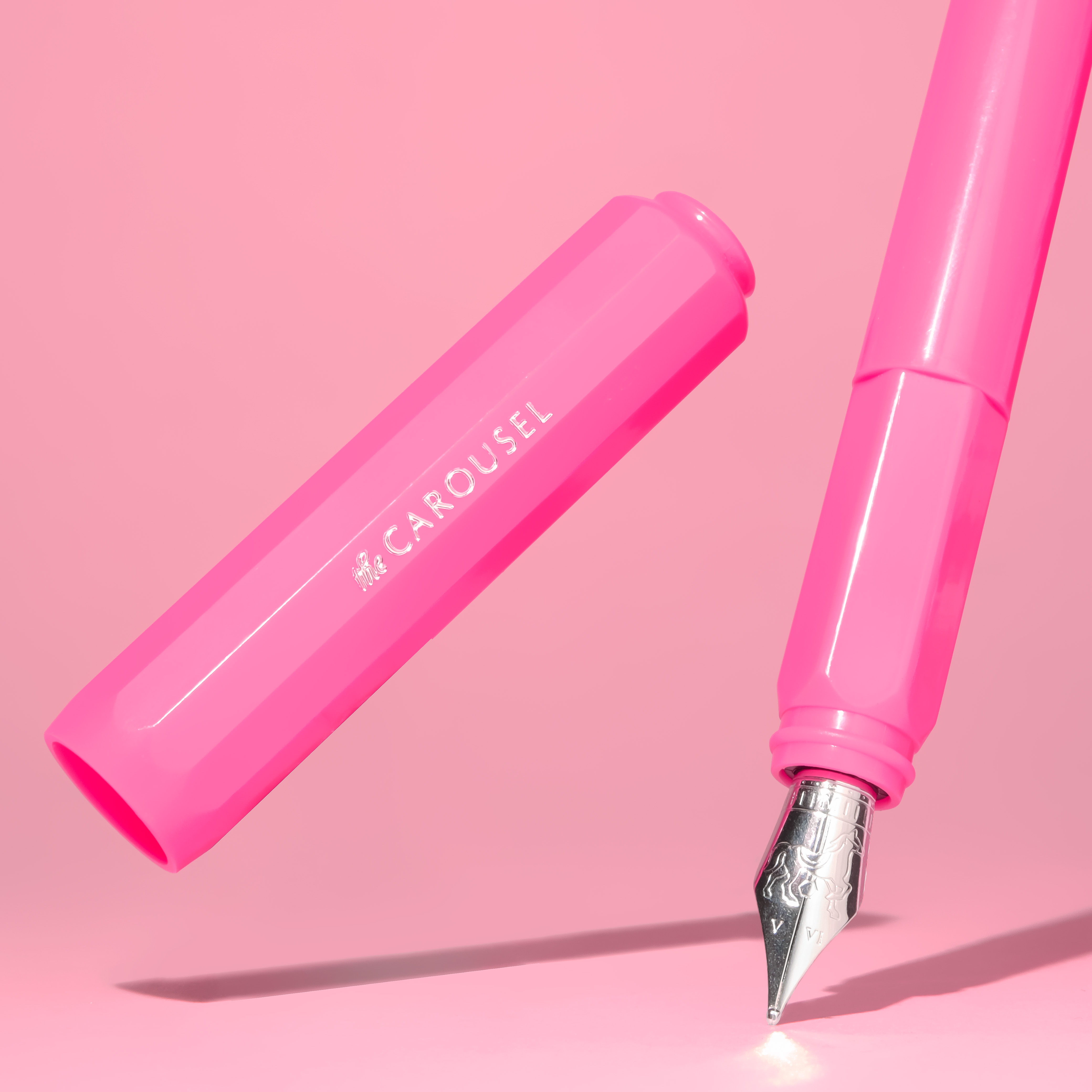 Malibu Blush pink Carousel fountain pen beside its illustrated box.